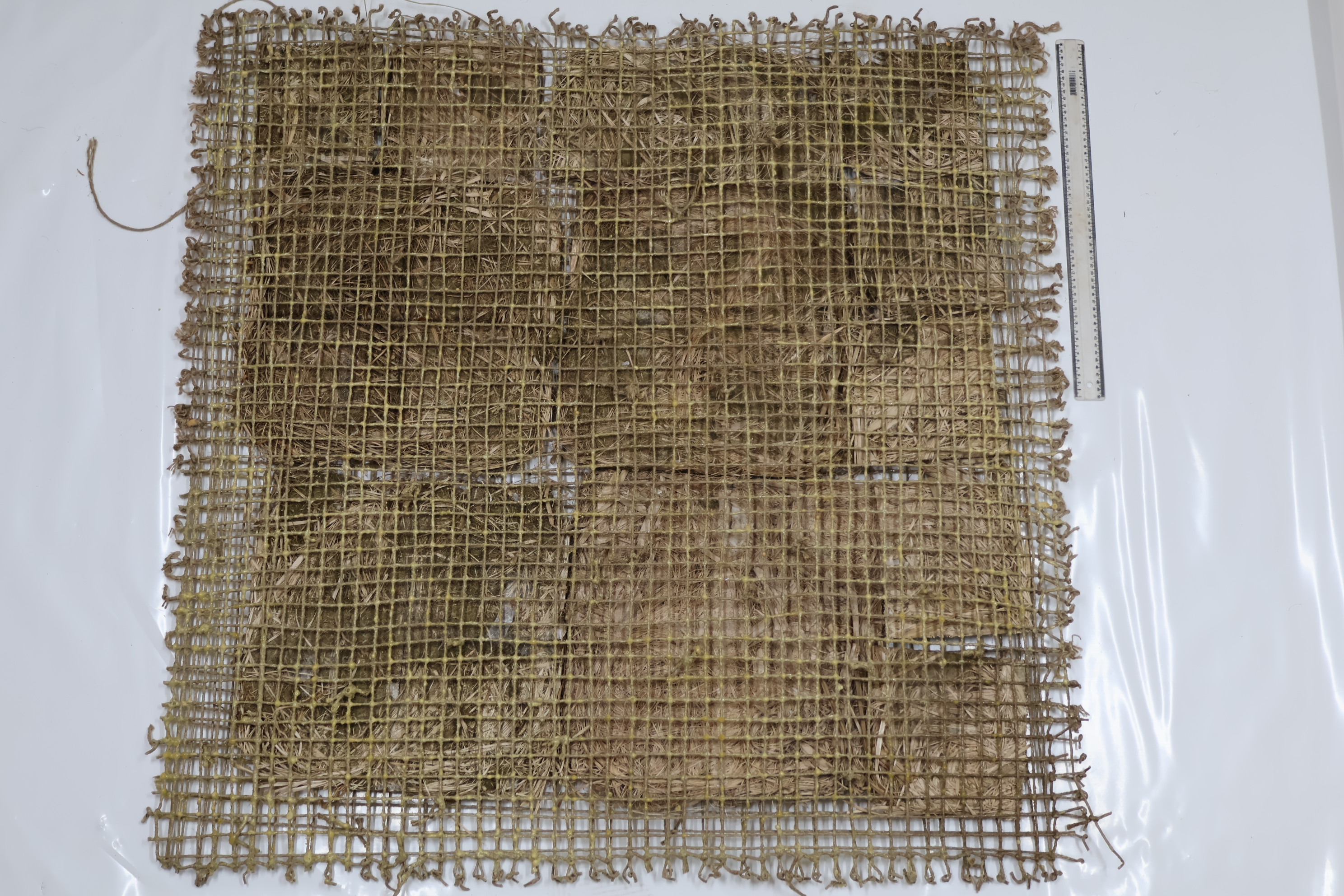 Detalhe da malha do geotêxtil de fibras naturais